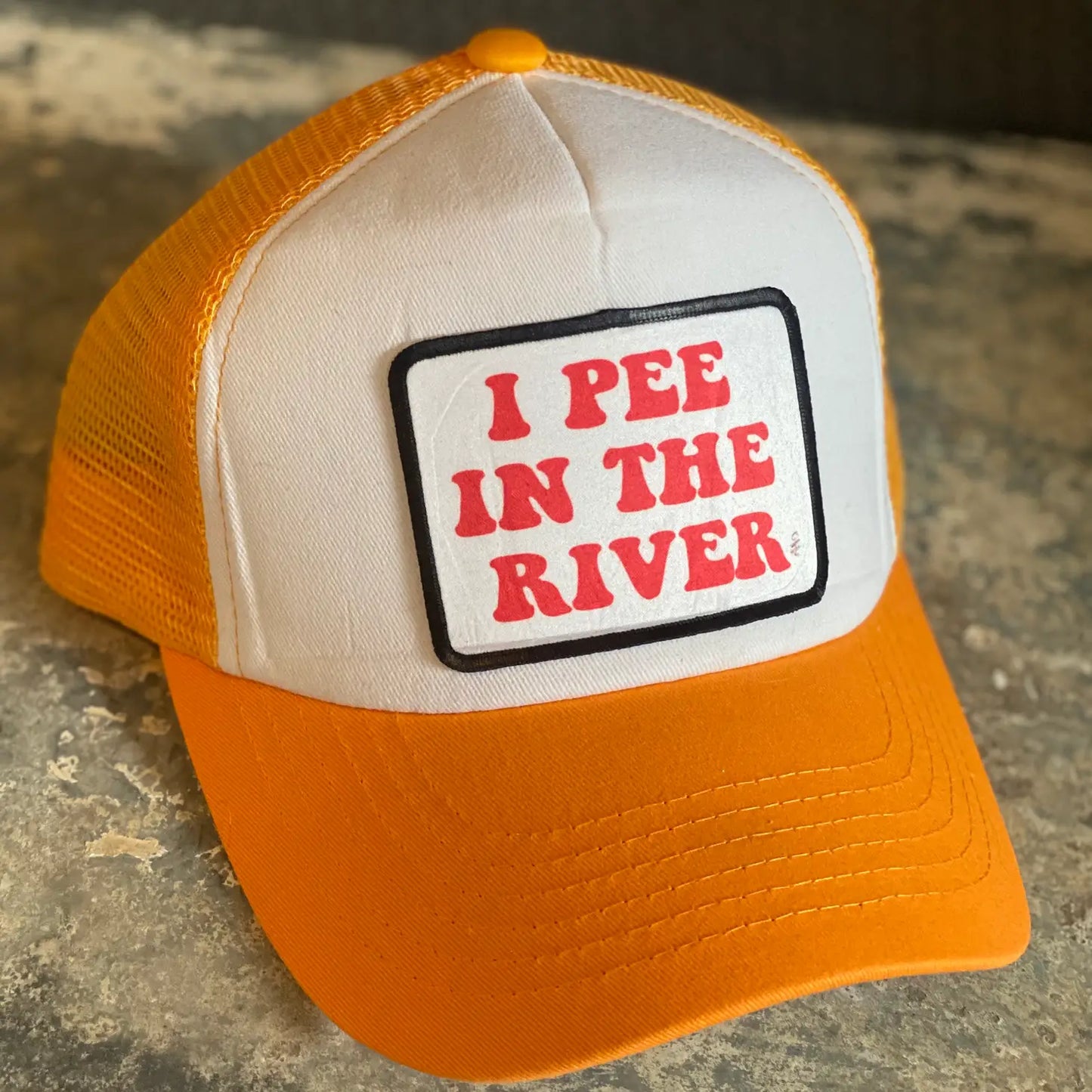I Pee in the River Trucker Hat