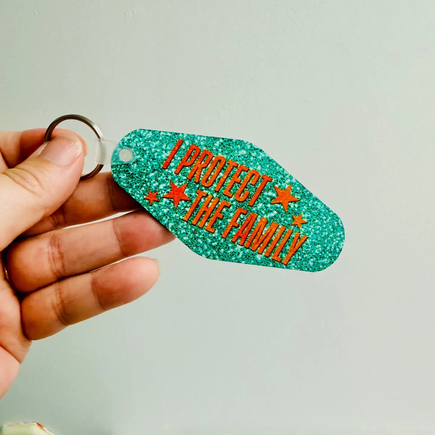 I Protect the Family Motel Style Keychain